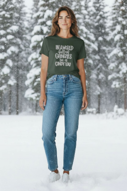 In a World Full Grinches Be a Cindy Lou T-Shirt – Cute Christmas Graphic Tee | Holiday Positive Quote Shirt